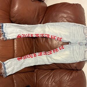 Men's Light Blue Skinny Jeans with Red Lettering